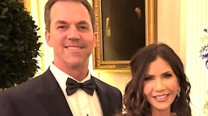 Kristi Noem appears with her husband, Bryon, speaking yet more speculation about her rumored affair with Corey Lewandowski.