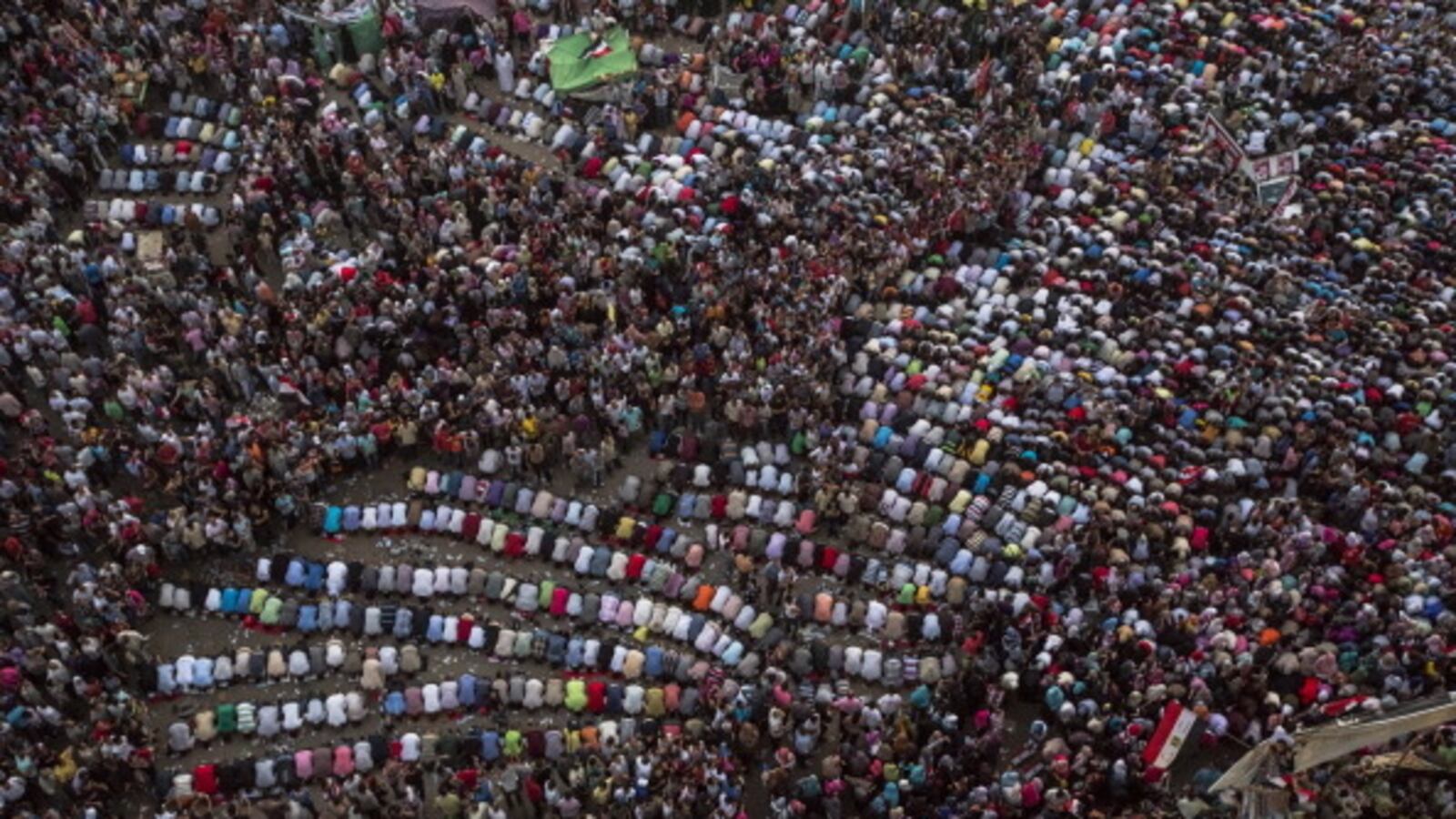 articles/2012/11/01/how-to-build-a-theocratic-democracy/egypt-prayer-openz_gfp9cs