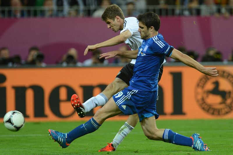 articles/2012/06/22/soccer-diplomacy-merkel-greece-near-critical-final-round-on-debt/germany-greece-soccer-nadeau_ohd15y