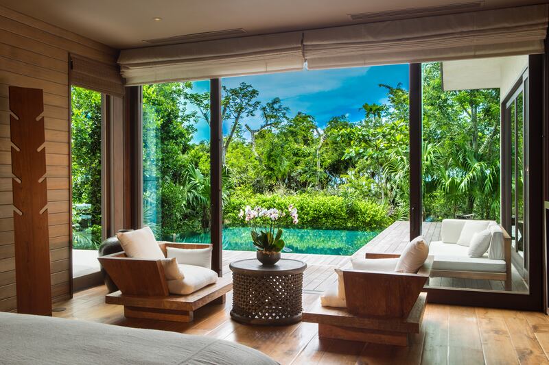 galleries/2014/11/29/omg-i-want-this-house-parrot-cay-turks-and-caicos-photos/141125-parrot-23_ifhuj5