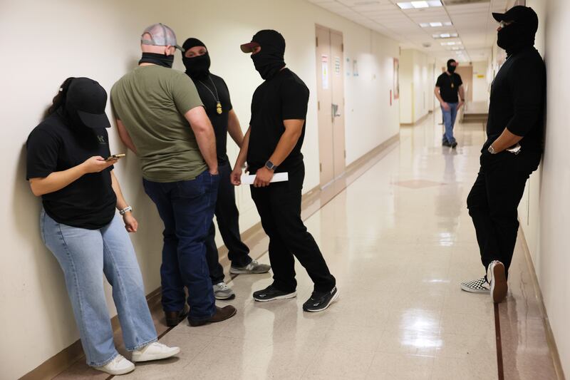 Federal agents patrol the hallways outside immigration court at the Jacob K. Javitz Federal Building on October 6, 2025 in New York City.