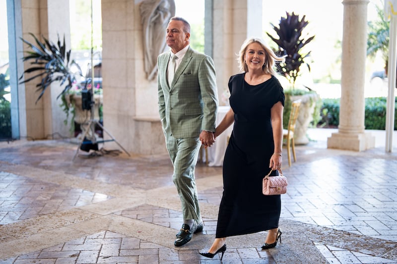 White House Press Secretary Karoline Leavitt and her husband Nicholas Riccio, arrive at Mar-a-Lago on February 1, 2026 in Palm Beach, Florida.