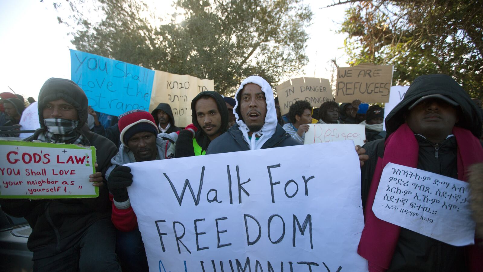 articles/2013/12/19/after-fleeing-war-and-genocide-african-refugees-in-israel-march-for-freedom/african-refugees-march-openz_kjewht