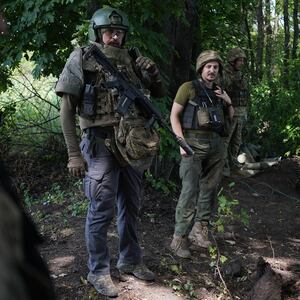 A photo of Ukrainian soldiers of the Bohun brigade near the Russian lines in Lyman, Ukraine.