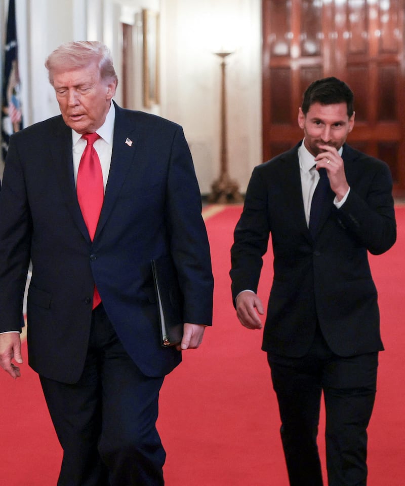 U.S. President Donald Trump arrives with Inter Miami CF captain Lionel Messi, on the day he honors reigning Major League Soccer (MLS) champion Inter Miami CF players and team officials with an event in the East Room of the White House in Washington, D.C., U.S., March 5, 2026. REUTERS/Jonathan Ernst