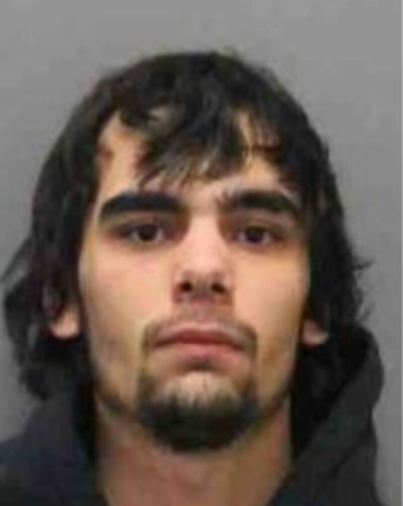 A mugshot of murder suspect Gage Ashley