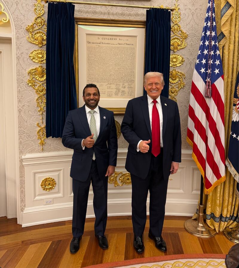 Press Secretary Karoline Leavitt posted this photo of Trump and Patel taken shortly after she showed the president the story alleging he planned to fire his FBI director.
