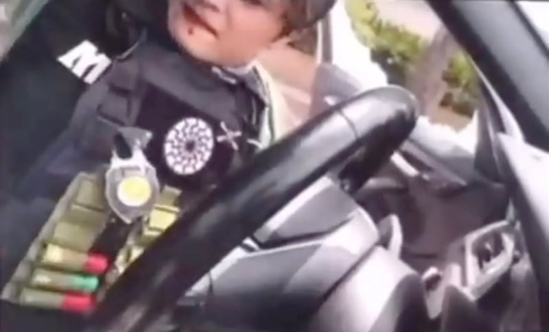 A still image from the alleged San Diego mosque shooters' livestream footage moments before Cain Clark, 17, shoots his accomplice Caleb Velasquez, 18, and turns the gun on himself.