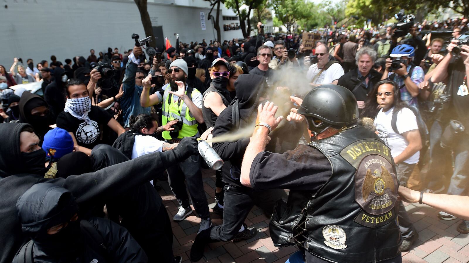 articles/2017/04/15/tax-day-protests-at-berkeley-against-chicken-trump-turn-violent/170415-bixby-tax-protests-tease_kr5i6o