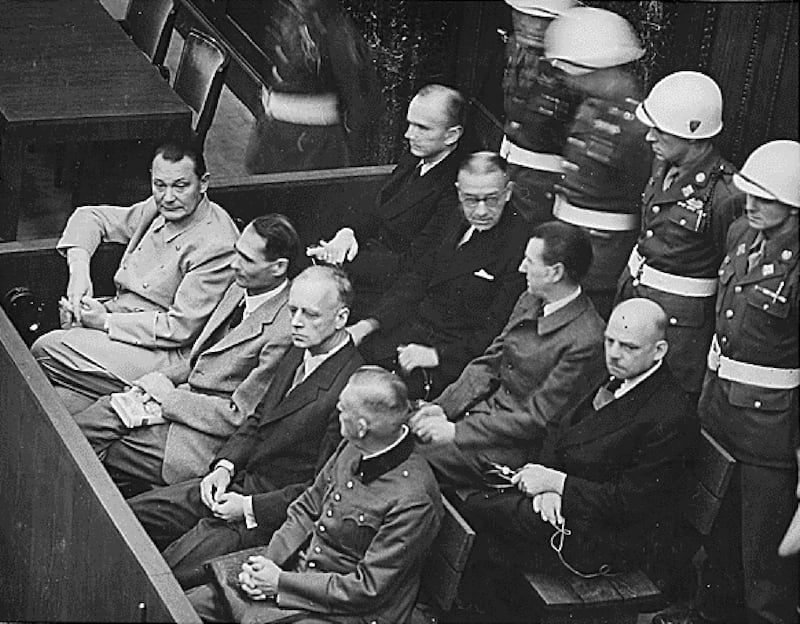 Nazi defendants (L-R front row) Hermann Goring, Rudolf Hess, Joachim von Ribbentrop and Wilhelm Keitel sit in the dock of their war crimes trial at Nuremberg circa 1945-1946. [The world's media, international officials, lawyers and human rights activists converged in The Hague on February 11, 2002 on the eve of Slobodan Milosevic's historic war crimes trial. The former Yugoslav leader, accused of masterminding ethnic cleansing in the Balkans in the 1990s,] faces the biggest European war crimes trial since Hitler's henchmen were tried at Nuremberg after World War Two.