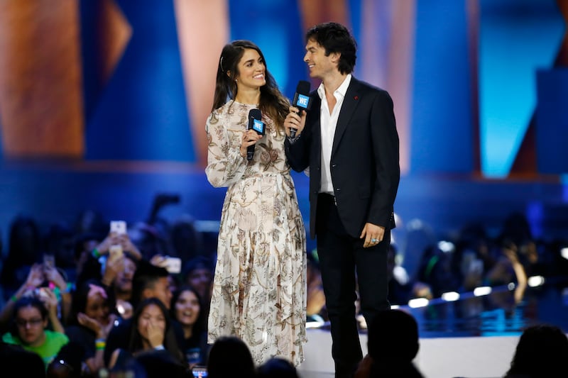 Actors Nikki Reed and Ian Somerhalder speak on stage during We Day California in Inglewood, California, April 7, 2016.