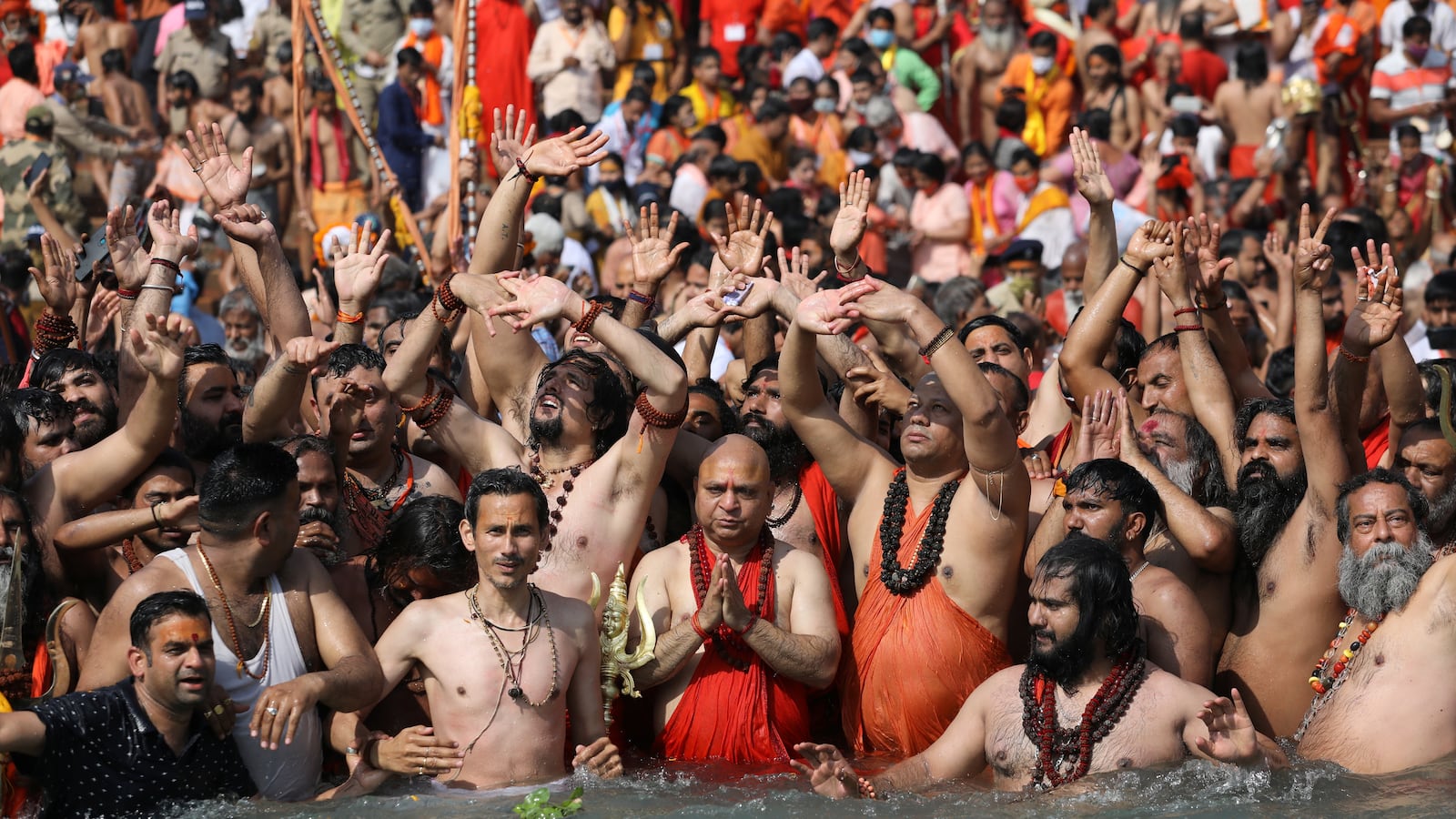 2021-04-14T084855Z_1371158891_RC2KVM9D0B71_RTRMADP_3_HEALTH-CORONAVIRUS-INDIA-KUMBH_kvts3c