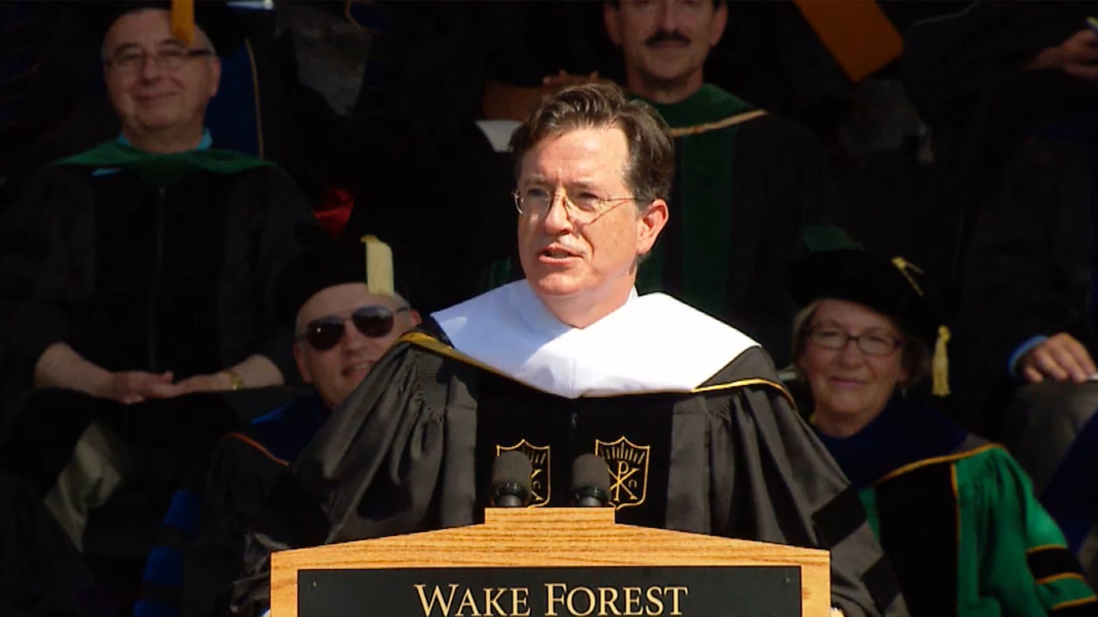 articles/2015/05/18/colbert-gives-grad-speech-at-wake-forest-university/150518-viralvid-colbert-tease_rmdmee