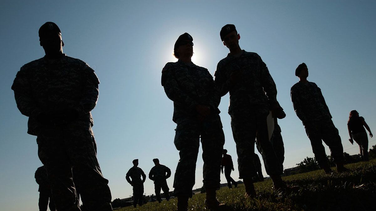 articles/2012/09/27/suicide-crisis-why-the-military-needs-mandatory-mental-health-services/army-suicide-awareness-morrison-tease_cpltx2