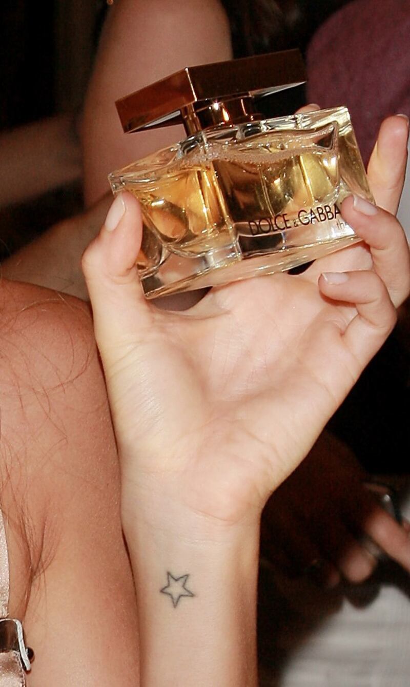 galleries/2012/09/05/kate-moss-to-gisele-bundchen-tattoos-guess-the-model-s-tattoos-photos/model-tattoos-gisele-close_clcnwc