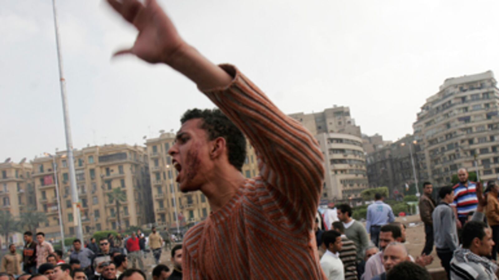 cheats/2011/04/09/two-killed-in-egypt-military-crackdown/egypt-army-attacks-protestors_h83y1d