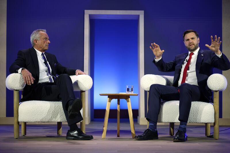 WASHINGTON, DC - NOVEMBER 12: U.S. Vice President JD Vance (R) and Secretary of Health and Human Services Robert F. Kennedy Jr. (L) participate in a discussion during The Official MAHA Summit at Waldorf Astoria Hotel on November 12, 2025 in Washington, DC. Top Trump administration officials, executives and influencers gathered to discuss the “Make America Healthy Again” agenda at the summit.
