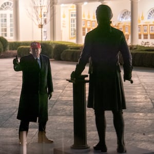 WASHINGTON, DC - MARCH 1: U.S. President Donald Trump examines a new statue of Thomas Jefferson in the Rose Garden after returning to the White House on Sunday, March 1, 2026 in Washington, D.C. Trump ordered strikes against Iran while spending the weekend at his Mar-a-Lago resort in Florida. (Photo by Peter W. Stevenson/The Washington Post via Getty Images)