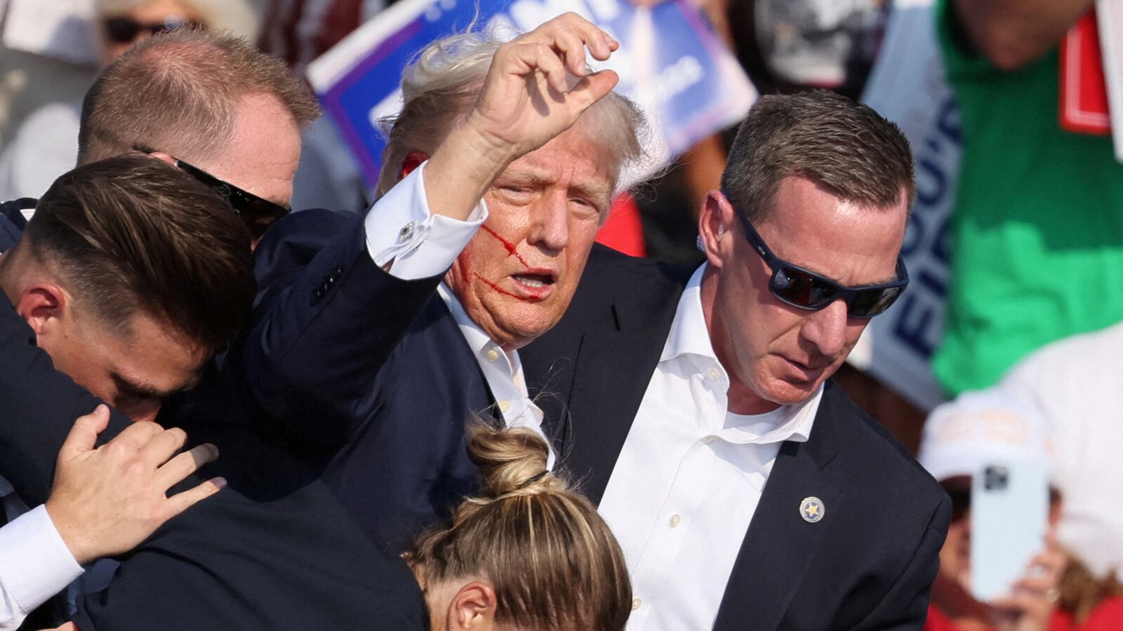 Donald Trump after being shot at a rally in July.