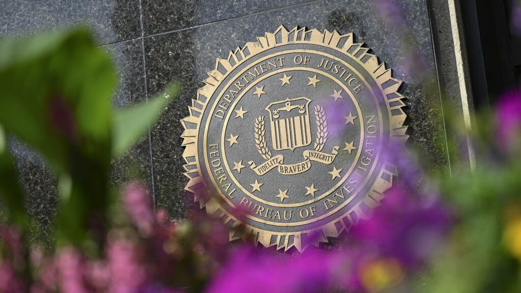 An FBI logo on the Federal Bureau of Investigation headquarters building.