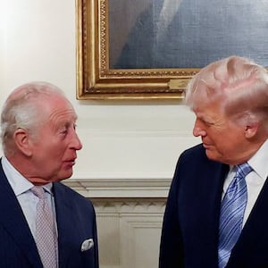 U.S. President Donald Trump and Britain's King Charles interact while posing for pictures at the White House in Washington, D.C., U.S., April 27, 2026. REUTERS/Suzanne Plunkett/Pool