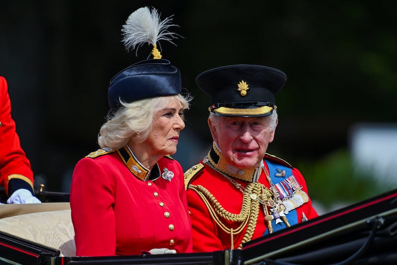 Britain's King Charles and Queen Camilla arrive for the Trooping the Colour parade to honour Britain's King Charles, as part of the official birthday celebrations, in London, Britain, June 13, 2026. REUTERS/Chris J. Ratcliffe