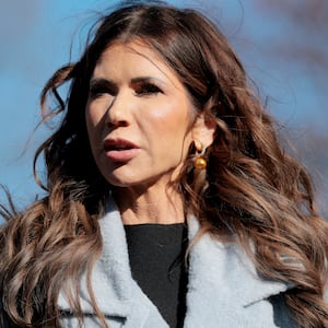 Secretary of Homeland Security Kristi Noem speaks to reporters outside of the White House on January 15, 2026.