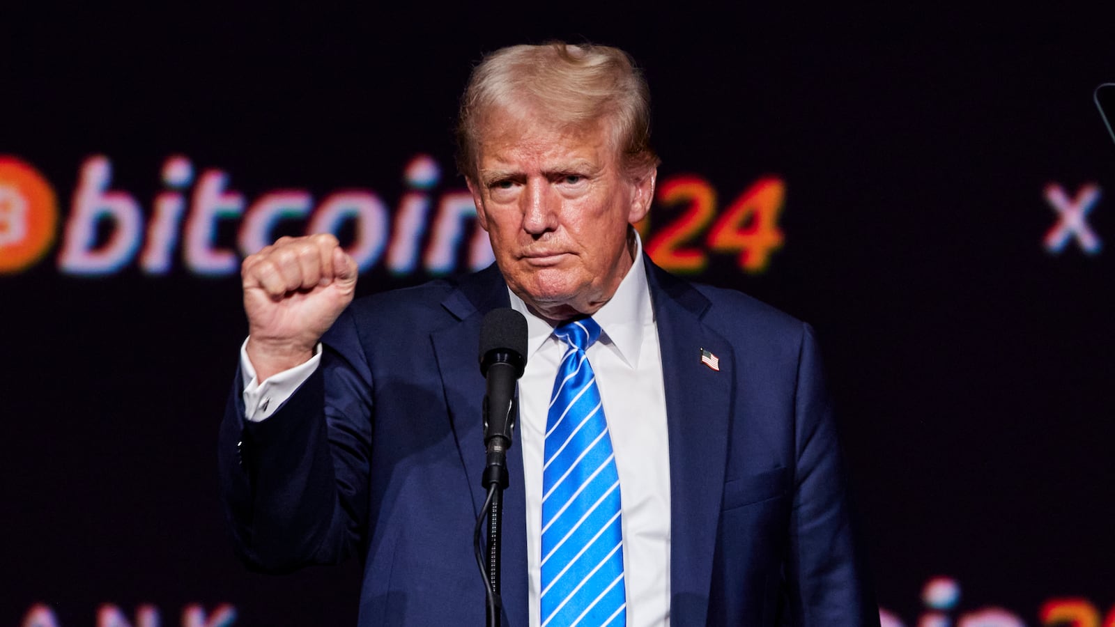 President-elect Donald Trump puts his fist up during his speech at the 2024 Bitcoin Conference in Nashville, TN.