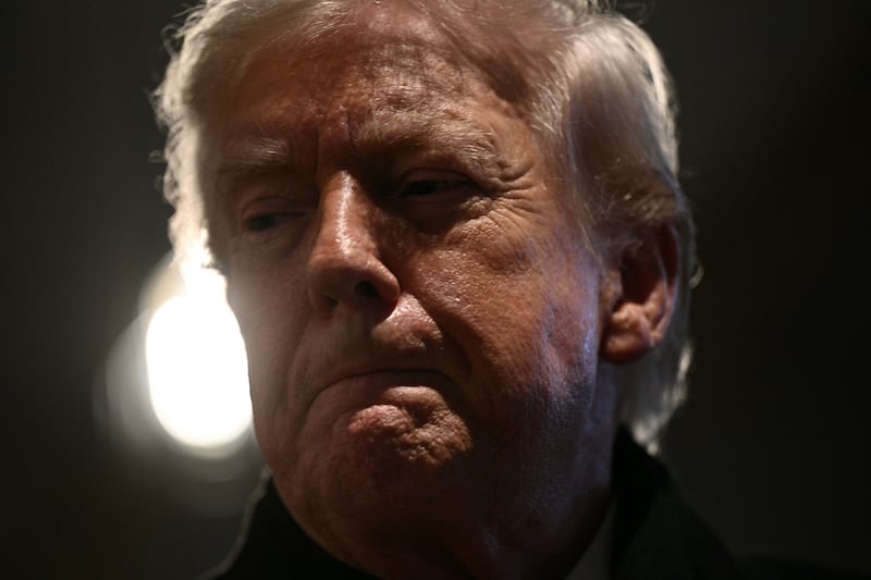 US President Donald Trump speaks during a stop at the Machine Shed restaurant in Urbandale, Iowa, on January 27, 2026. (Photo by Brendan SMIALOWSKI / AFP via Getty Images)
