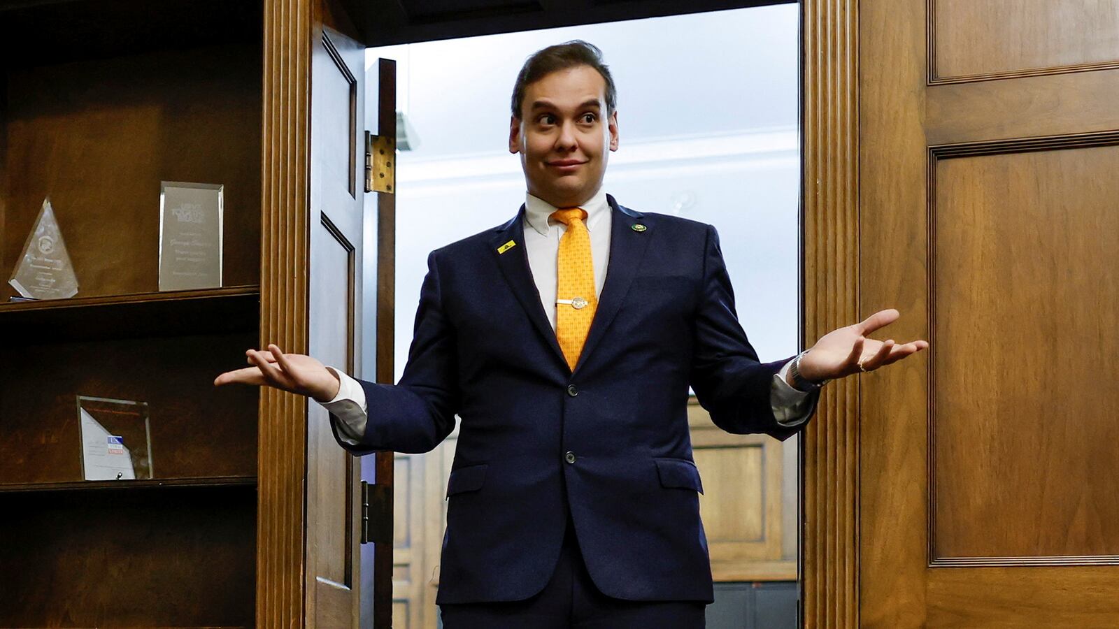 U.S. Representative George Santos (R-NY) chats with his State of the Union guest and members of his staff as they prepare for the evening in Santos’s office on Capitol Hill in Washington, U.S. February 7, 2023.