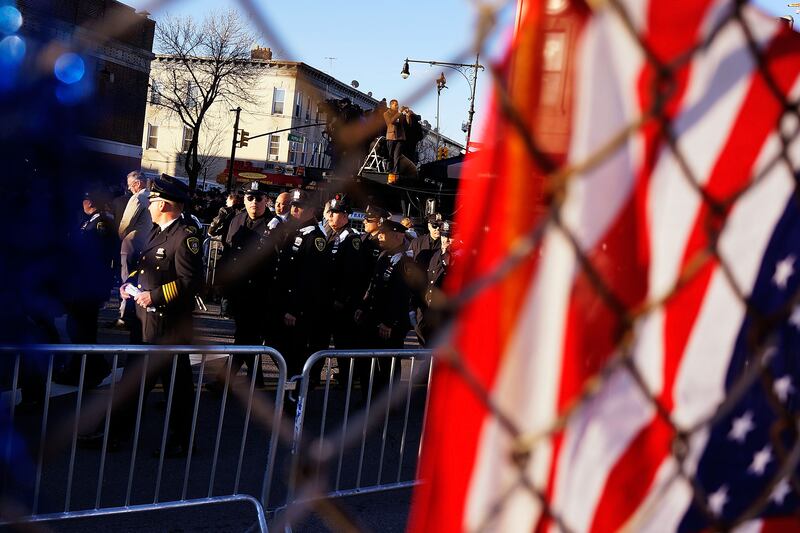 galleries/2014/12/27/the-nypd-says-farewell-to-officer-ramos/141227-police-funeral-02_kowx0d