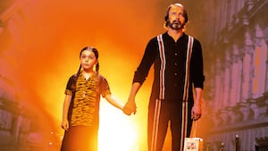 A photo illustration of Mads Mikkelsen and Sophie Sloan in Dust Bunny.