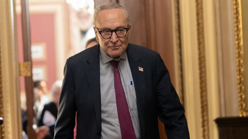 Senate Minority Leader Chuck Schumer, pictured leaving the Democratic caucus meeting on November 9, is under fire after a group of eight Senate Democrats caved and reached a deal with Republicans to end the government shutdown even though he voted against moving forward with it.