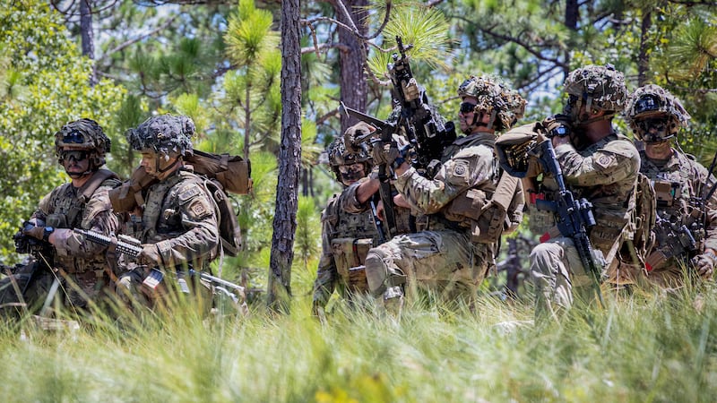 Paratroopers assigned to 2nd Battalion, 504th Parachute Infantry Regiment “White Devils,” 1st Brigade Combat Team, 82nd Airborne Division get ready to conduct live fire exercises during Devil Avalanche at Fort Bragg, North Carolina, July 28, 2025.