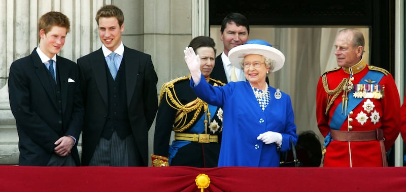 Britain's Princes Harry (L) and William (2L), Princess Anne (3L), Britain's
Queen Elizabeth II (2R) and the Duke of Edinburgh (R) acknowledge the crowds
from the balcony of Buckingham Palace during the annual Trooping the Colour Parade held to mark the Queen's birthday in central London, June 14, 2003.