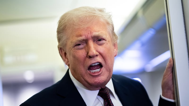 IN FLIGHT - MARCH 15: U.S. President Donald Trump speaks to members of the media onboard Air Force One on March 15, 2026 while en route to Joint Base Andrews, Maryland from West Palm Beach Florida. President Trump returned to Washington D.C. on Sunday following a weekend trip to Florida. (Photo by Nathan Howard/Getty Images)