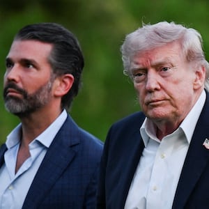 U.S. President Donald Trump and his son Donald Trump Jr. arrive at the White House in Washington, D.C., U.S., May 3, 2026. REUTERS/Annabelle Gordon
