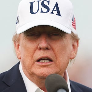 U.S. President Donald Trump speaks at the Amgen Irish Open 2026, at Trump International Golf Links in Doonbeg, County Clare, Ireland, September 13, 2026. REUTERS/Cathal McNaughton