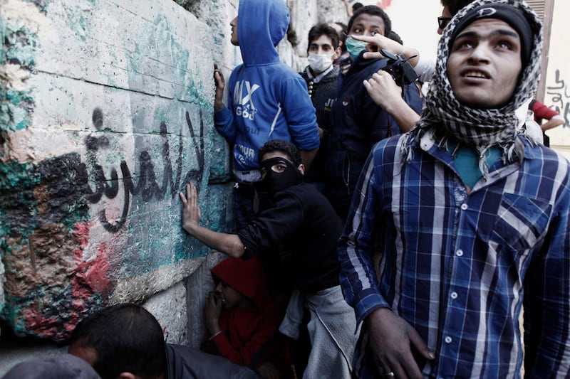 galleries/2013/01/29/rage-in-egypt-over-port-said-verdict-morsi-government-photos/egypt-unrest-6_rme0fu