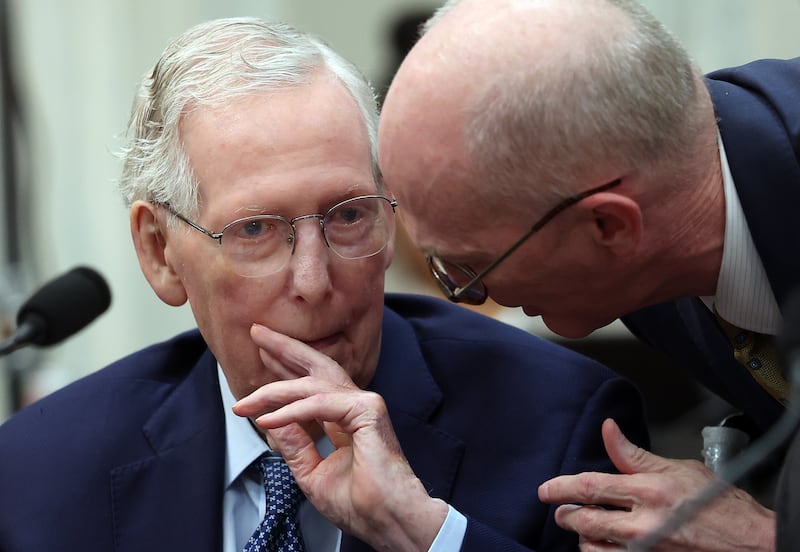 Sen. Mitch McConnell talks to his Chief of Staff Terry Carmack, who makes $226,000 annually, during a Senate Agriculture Committee meeting on the Agricultural Act of 2026 in the Russell Senate Office Building on September 16, 2026 in Washington, DC.