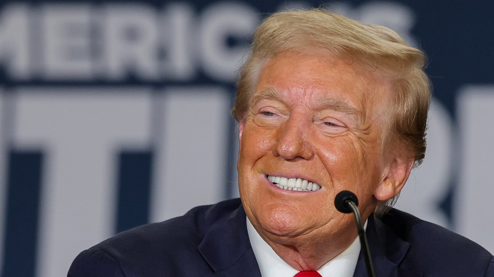 Republican presidential nominee and former U.S. President Donald Trump smiles during a Hispanic roundtable at Beauty Society on October 12, 2024 in North Las Vegas, Nevada.