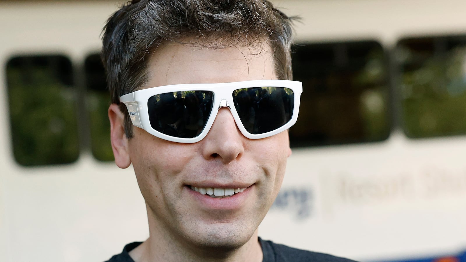OpenAI CEO Sam Altman wore bizarrely large white sunglasses for the occasion.