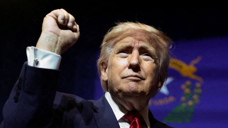 Donald Trump gestures after delivering remarks.
