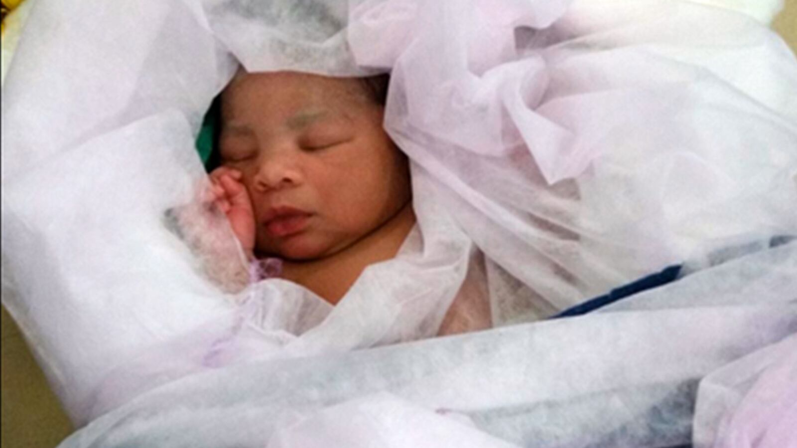 articles/2015/05/04/the-immigrant-baby-born-on-the-high-seas/150504-barbie-baby-hazmat-tease_qugn5e