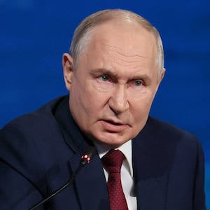 Russia's President Vladimir Putin attends a forum.
