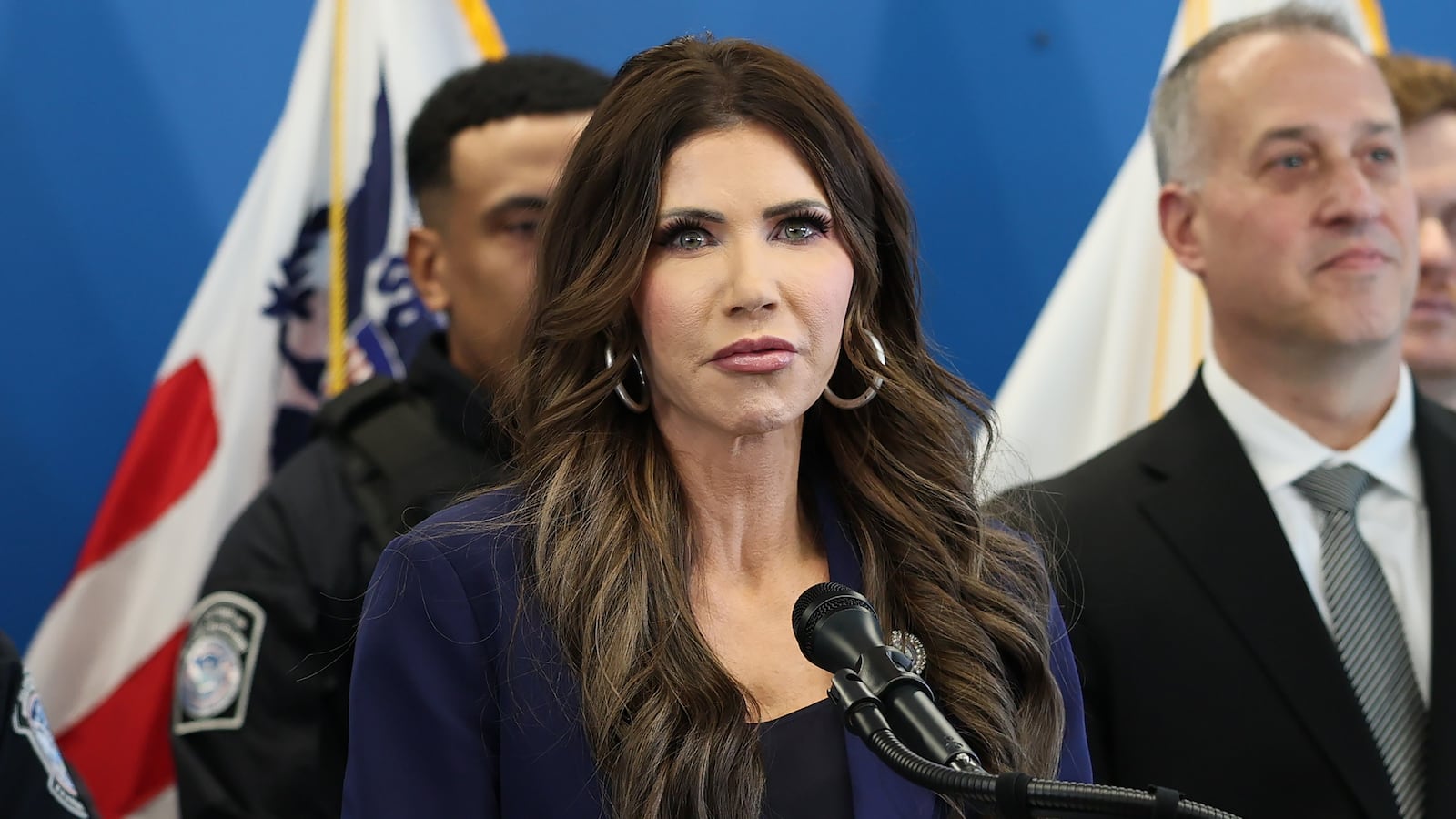 NEW YORK, NEW YORK - JANUARY 08: U.S. Secretary of Homeland Security Kristi Noem speaks during a press conference addressing the capture of suspects involved in the July 2025 shooting of an off-duty U.S. Customs and Border Protection Officer in Fort Washington Park, at One World Trade Center on January 08, 2026 in New York City. Following yesterday's fatal shooting of a woman by an ICE agent during a confrontation in Minneapolis, Noem addressed the Trump administration's ongoing immigration enforcement efforts in New York City. (Photo by Michael M. Santiago/Getty Images)
