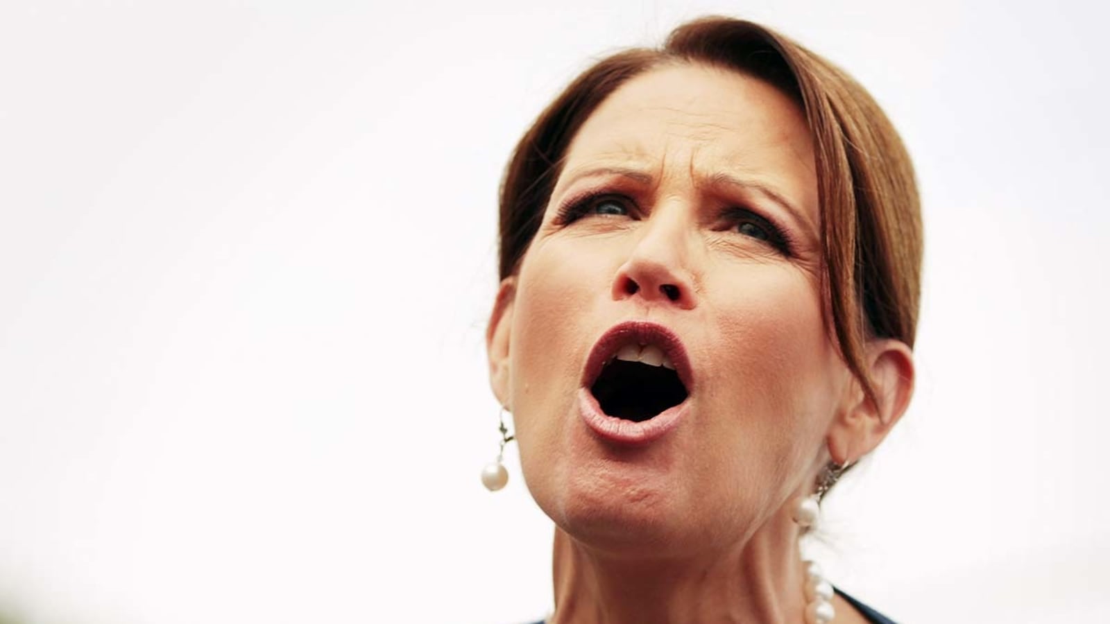 articles/2013/05/29/michele-bachmann-is-done-her-hostage-video-to-reality/bachmann-yells-out-tease_ruzt6u