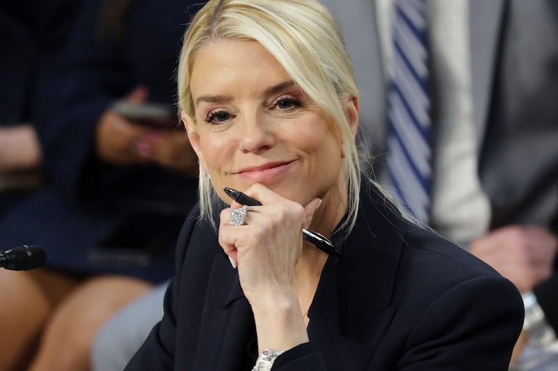 Attorney General Pam Bondi consistently wears her wedding ring and a cross necklace.