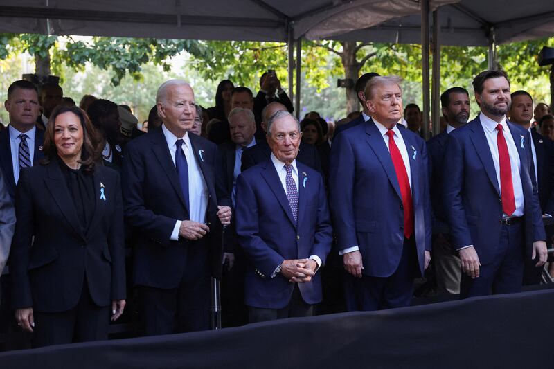 Republican presidential nominee and former U.S. President Donald Trump and Republican U.S. vice presidential nominee Senator JD Vance, U.S. President Joe Biden and Democratic presidential nominee and Vice President Kamala Harris stand on the day of a ceremony marking the 23rd anniversary of the September 11, 2001 attacks on the World Trade Center at the 9/11 Memorial and Museum in the Manhattan borough of New York City, U.S., September 11, 2024.
