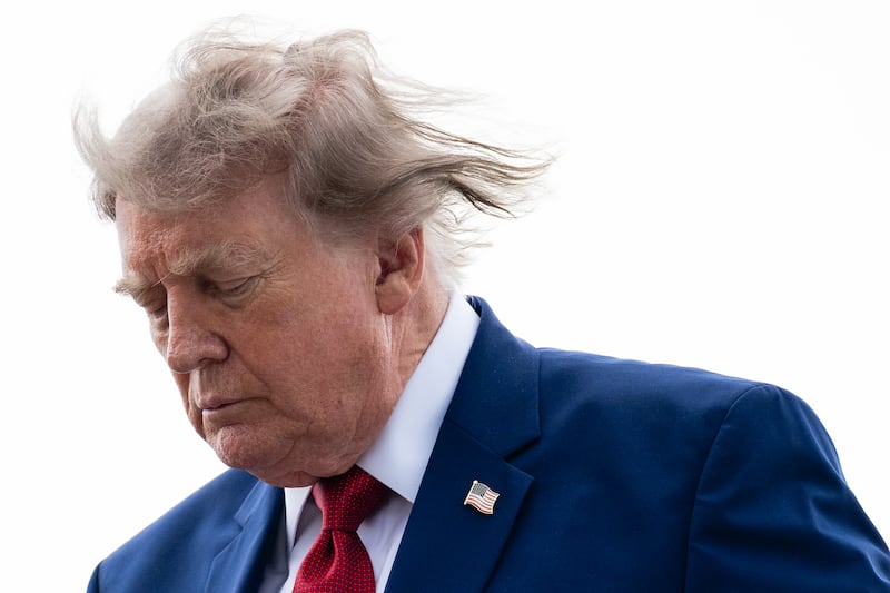 NEWARK, NEW JERSEY - AUGUST 07: U.S. President Donald Trump walks off of Air Force One at Newark Liberty International Airport on August 7, 2026 in Newark, New Jersey. President Trump is spending the weekend at Trump National Golf Club Bedminster. (Photo by Eric Lee/Getty Images)